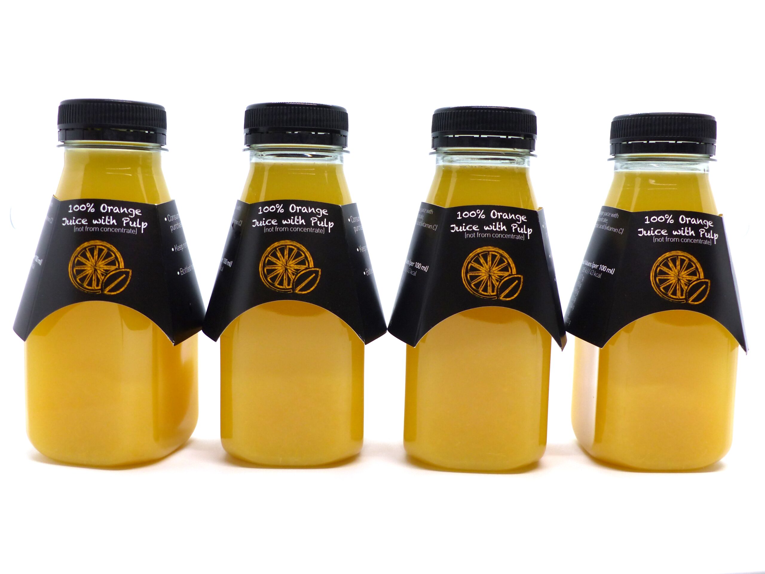 Orange Juice in Arc Bottle with Display Collar from Oranka Juice Solutions