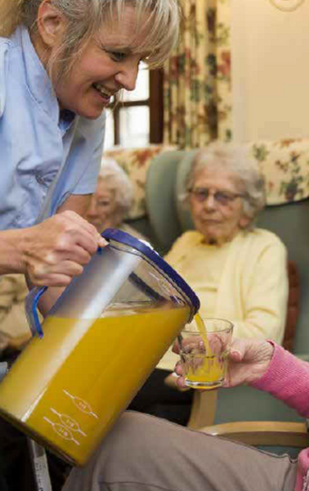 Fill Line Jug with Orange Juice in Care Home from Oranka Juice Solutions